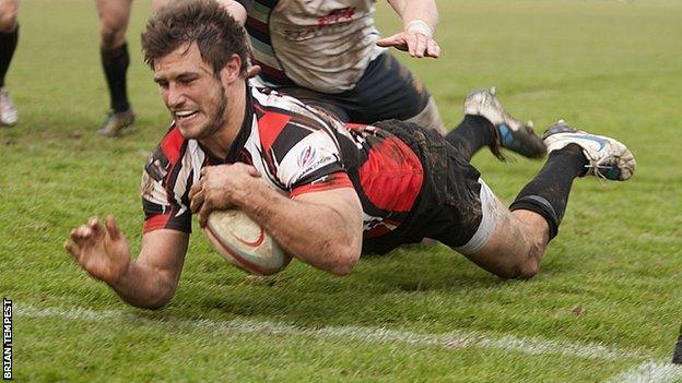 Ben Maidment goes over for a try