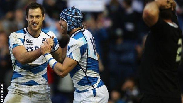 Tim Visser celebrates his try for Scotland