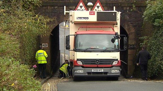 Lorry stuck under Plymouth rail bridge