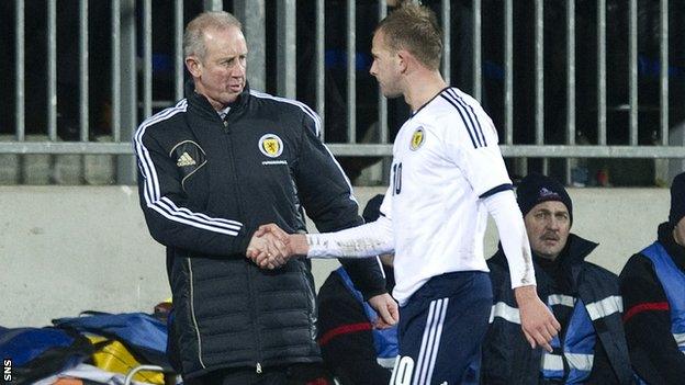 Billy Stark congratulates Scotland striker Jordan Rhodes on his two-goal performance