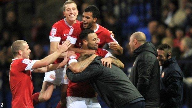 Barnsley celebrate Craig Davies' equaliser