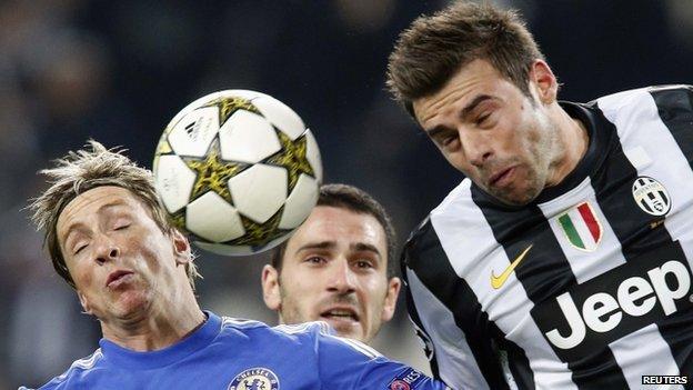 Chelsea's Fernando Torres jumps for the ball