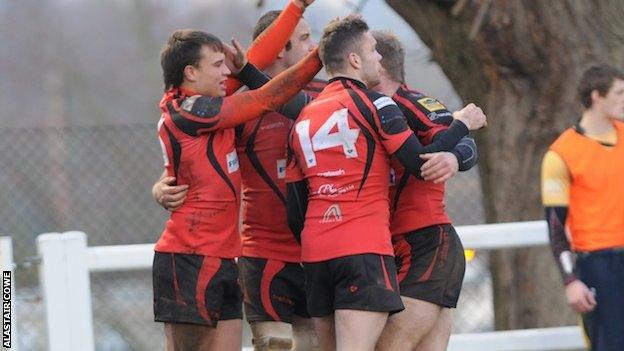 Redruth celebrate a try against Henley last season