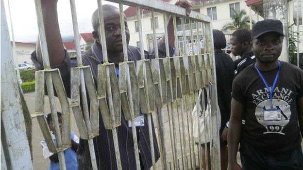 Guards on duty at the gates of Buea Regional Hospital