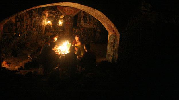 A meeting in the catacombs