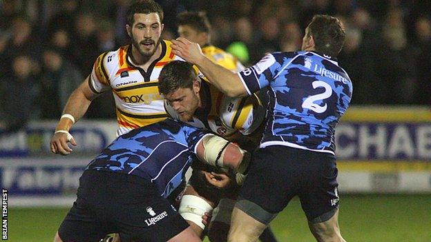 Darren Barry is tackled by Bedford players