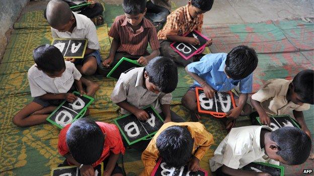 Schoolchildren with slates