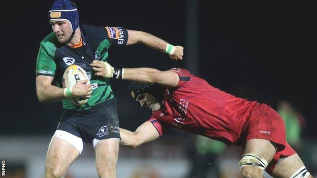 Connacht's Dave McSharry is tackled by Sean Cox of Edinburgh