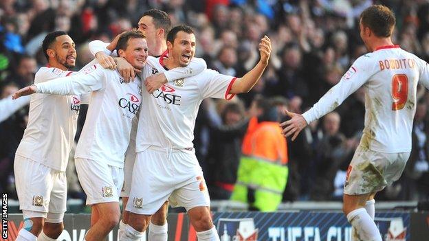 MK Dons players celebrate