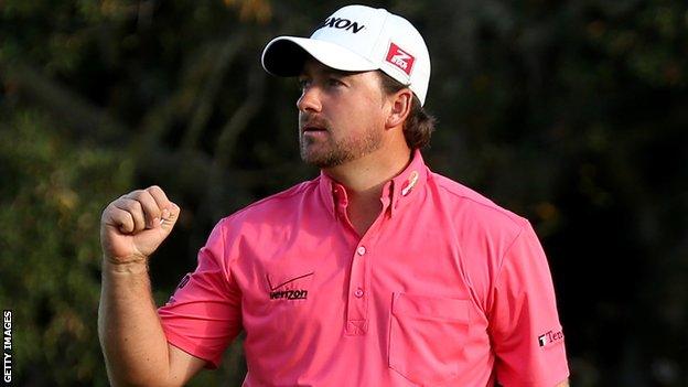 Graeme McDowell celebrates after clinching the World Challenge title in California