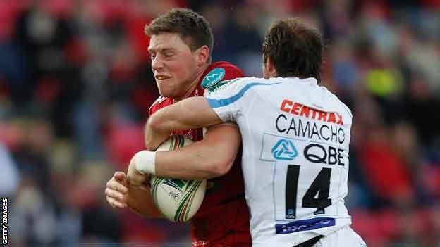 Rhys Priestland is halted by Gonzalo Camacho,