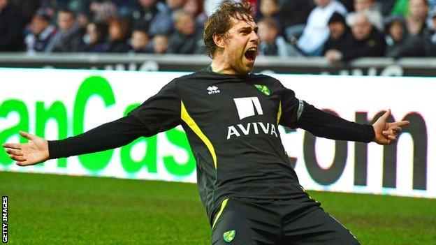 Grant Holt celebrates