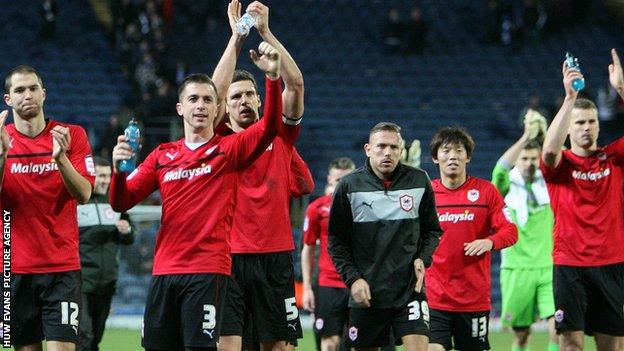 Cardiff City players celebrating their 4-1 win at Blackburn Rovers