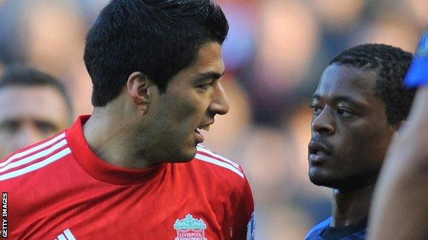 Luis Suarez and Patrice Evra