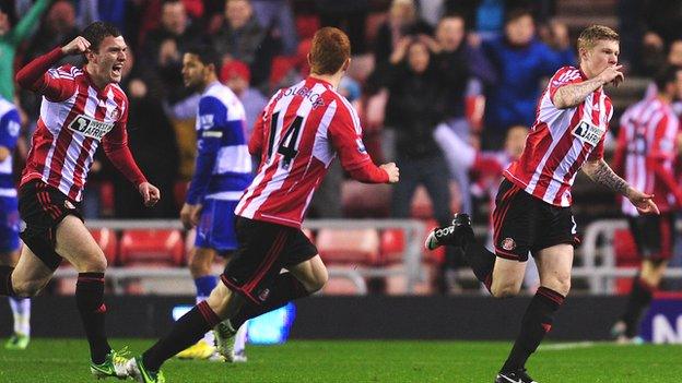 James McClean (right) celebrates giving Sunderland the lead