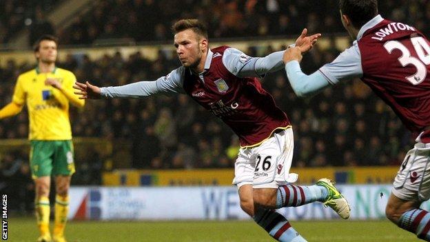 Andreas Weimann (centre) celebrates scoring