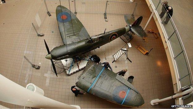 Spitfire being dismantled at the Imperial War Museum in London