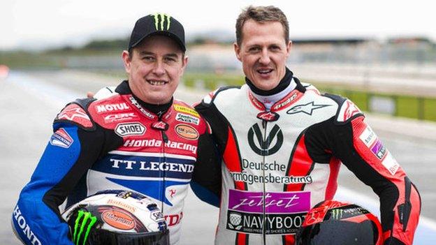 John McGuinness and Michael Schumacher