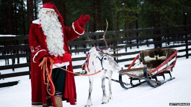 Santa Claus with reindeer