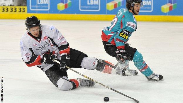 Darryl Lloyd battles with Stuart McRae in Friday's match at the Odyssey Arena