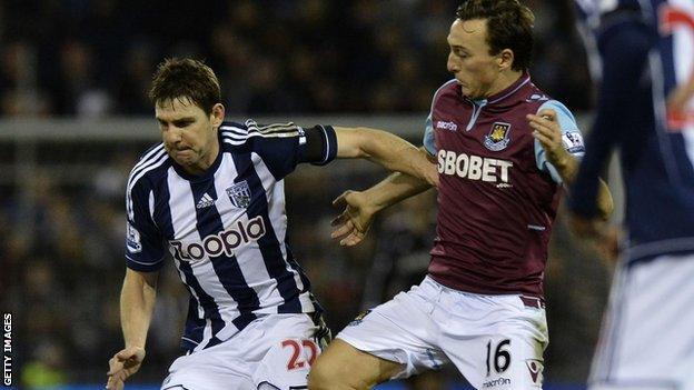 West Brom midfielder Zolten Gera (left) and West Ham midfielder Mark Noble