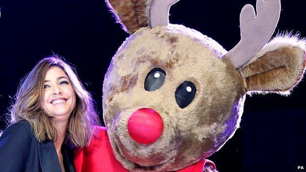A fancy dress reindeer with a big red nose
