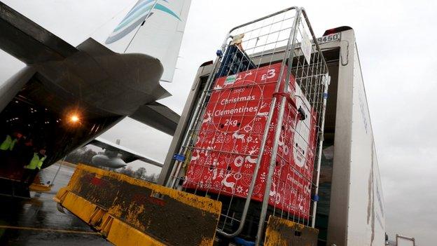 Handout photo issued by Tesco of a Hercules plane being loaded with food for Christmas at Edinburgh airport, en route to Shetland, where the supplies will be delivered to the Tesco store in Lerwick.