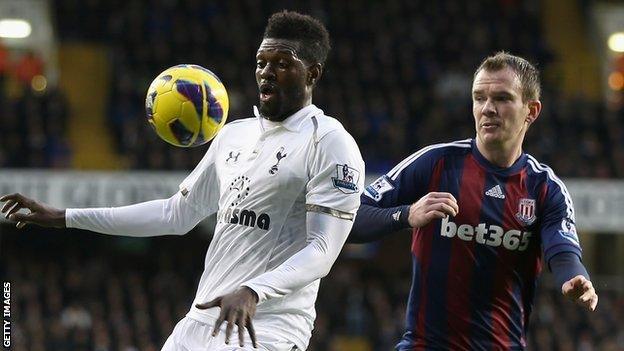 Emmanuel Adebayor and Glenn Whelan