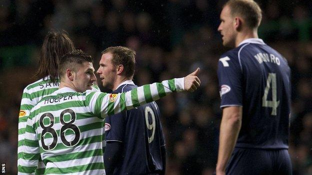 Gary Hooper celebrates as Grant Munro looks disconsolate