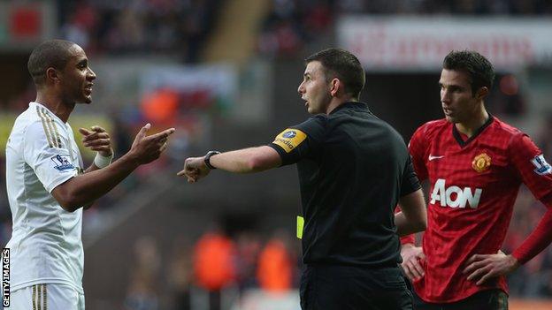 Ashley Williams and Robin van Persie