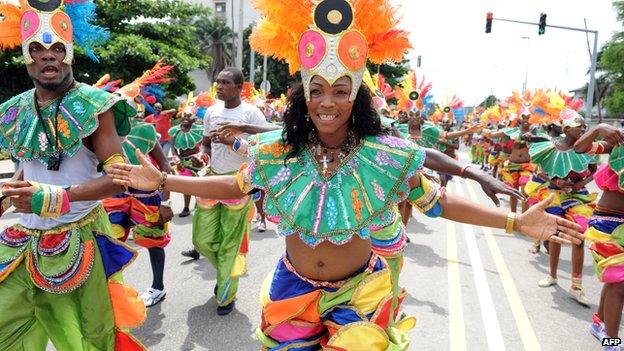 People dance at a carnival in Lagos, Nigeria (9 April 2012)