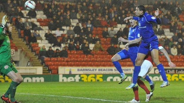 Curtis Davies (right) heads Birmingham's winner at Barnsley