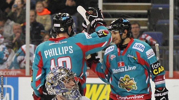 Dave Phillips congratulates goalscorer Kevin Saurette