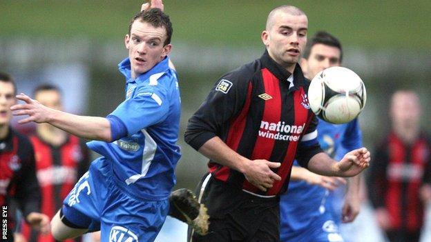 David Kee challenges Crusaders captain Colin Coates