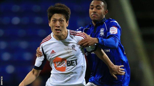 Bolton Wanderers' Chung-Yong Lee and Birmingham City's Robbie Hall