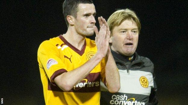 Jamie Murphy is encouraged onto the park by manager Stuart McCall