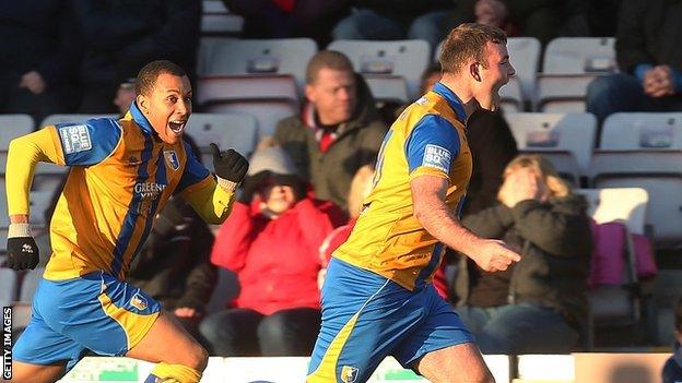 Matt Rhead (right) celebrates his crucial last-gasp equaliser against Lincoln in this season's FA Cup