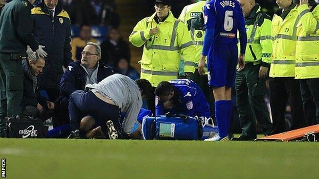 Will Packwood is stretchered off