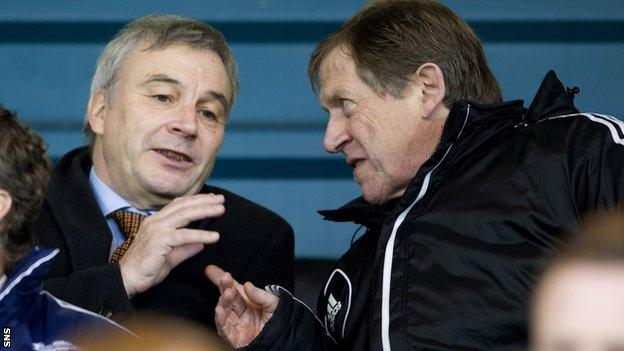 Uefa general secretary David Taylor (left) chats with Livingston chairman Gordon McDougall