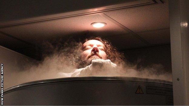 Wales prop Adam Jones 'enjoys' a cryotherapy session at a training camp