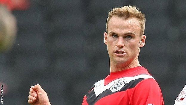 Huddersfield forward Kallum Higginbotham