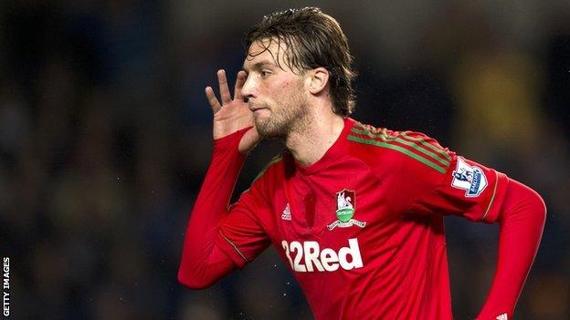 Miguel Michu celebrates his goal against Chelsea