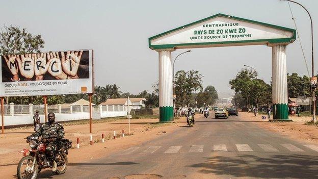 An arch in the centre of Bangui which reads: "Centreafrique, pays de zo kwe zo."