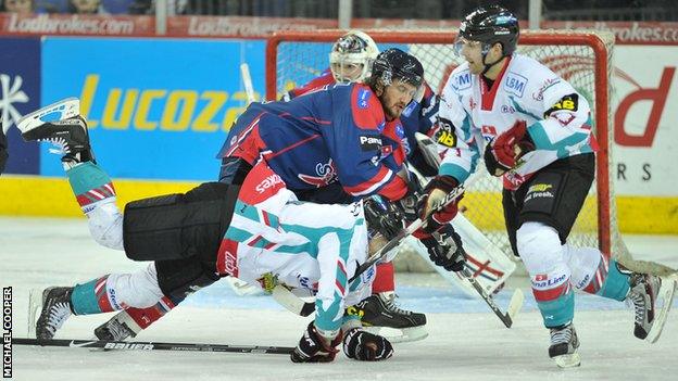 Belfast's Daymen Rycroft battles with Dundee's Doug Krantz in Friday's game