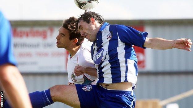 Ballymena's Mark Surgenor and Michael Hegarty of Coleraine contest the high ball