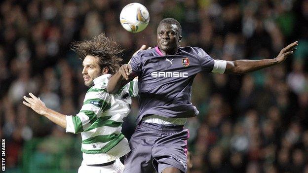 Kader Mangane (right) challenges Celtic's Georgios Samaras