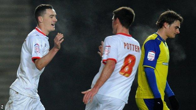 Shaun Williams (left) celebrates his goal