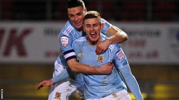 Tom Cairney (right) celebrates scoring the winning goal for Hull