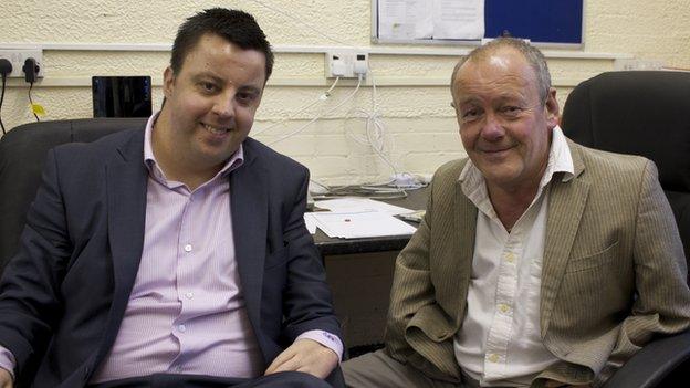 Oli Randell and Carl Lawton in the operations room of Ability Tec