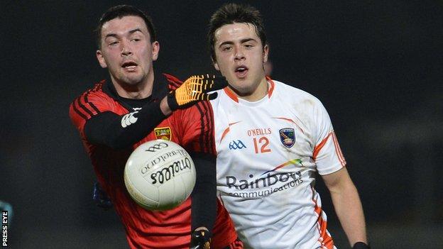 Damian Turley battles with Stefan Campbell at Newry